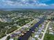 A waterfront property featuring a private dock with direct Gulf access, a pool, and beautifully landscaped yard at 4051 Rock Creek Dr, Port Charlotte, FL 33948