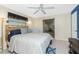 Inviting bedroom offers comfortable sleeping space with natural light and a ceiling fan at 4051 Rock Creek Dr, Port Charlotte, FL 33948