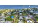 Scenic aerial view showcases a charming neighborhood near the bay, with lush greenery and brick streets at 415 W Marion Ave, Punta Gorda, FL 33950