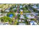 Aerial view shows property's location on tree-lined street, close to local amenities and waterfront at 415 W Marion Ave, Punta Gorda, FL 33950