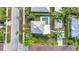 Overhead view highlighting the property's layout, including the pool, patio, and mature landscaping at 415 W Marion Ave, Punta Gorda, FL 33950