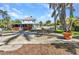 Outdoor patio area with elegant furniture, ideal for entertaining guests or enjoying peaceful moments at 415 W Marion Ave, Punta Gorda, FL 33950
