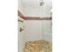 Modern shower with light tile at 415 W Marion Ave, Punta Gorda, FL 33950