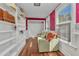Reading nook with shelves and windows at 415 W Marion Ave, Punta Gorda, FL 33950