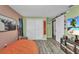 Spacious bedroom featuring an ample closet and hardwood floors at 457 Glenridge Nw Ave, Port Charlotte, FL 33952