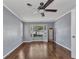 Bedroom with bay window and wood-look floors at 496 Fletcher St, Port Charlotte, FL 33954