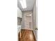 Laundry room with utility sink and view into the adjacent room at 496 Fletcher St, Port Charlotte, FL 33954