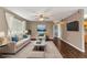 Bright living room featuring neutral tones, modern decor, and sleek hardwood floors at 496 Fletcher St, Port Charlotte, FL 33954