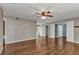 Spacious living room with hardwood floors, neutral paint and ceiling fan at 496 Fletcher St, Port Charlotte, FL 33954