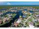 Stunning aerial view of waterfront home in a desirable community with boat access to the Gulf of Mexico at 531 Madrid Blvd, Punta Gorda, FL 33950