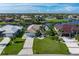 Expansive aerial view of waterfront homes with lush landscaping and private docks at 531 Madrid Blvd, Punta Gorda, FL 33950