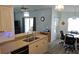 Bright kitchen with dining area featuring modern appliances and plenty of natural light at 6341 Opa Locka Ln, North Port, FL 34291