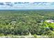 Vast wooded acreage provides a serene, secluded setting for the property at 6514 N Biscayne Dr, North Port, FL 34291