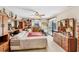 Spacious bedroom with furniture and sliding glass doors leading to the outdoor area at 6514 N Biscayne Dr, North Port, FL 34291