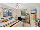 Bright bedroom with ensuite bath and plenty of natural light at 6514 N Biscayne Dr, North Port, FL 34291