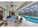 Lanai with seating and pool views at 6514 N Biscayne Dr, North Port, FL 34291