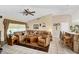 Living room with comfortable seating, decorative elements, and an open layout at 6514 N Biscayne Dr, North Port, FL 34291
