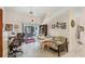 Bright room with ceiling fan, sliding door, and access to outdoor area at 6514 N Biscayne Dr, North Port, FL 34291