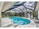 Screened in pool with plenty of privacy at 6514 N Biscayne Dr, North Port, FL 34291