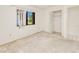 Bedroom featuring a window with natural light and closet with bi-fold doors at 6540 Kenwood Dr, North Port, FL 34287