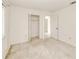 Bedroom featuring a closet, neutral carpet, and an open doorway at 6540 Kenwood Dr, North Port, FL 34287