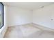 Bedroom with a window that gives a great view of the outdoors, and a closet at 6540 Kenwood Dr, North Port, FL 34287