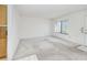 Bright living room with clean walls, a large window, and a welcoming entrance, ready for your personal touch at 6540 Kenwood Dr, North Port, FL 34287