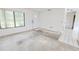 Bright living room with neutral carpet and a large window at 6540 Kenwood Dr, North Port, FL 34287
