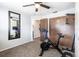 This is an exercise room with a spin bike and large mirror at 8513 Heister St, Punta Gorda, FL 33982