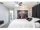 Cozy main bedroom with a large closet, comfortable bed, and neutral color scheme at 8513 Heister St, Punta Gorda, FL 33982