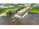 Beautiful waterfront condo featuring a private pool, dock, lounge area, and amazing water views at 900 E Marion Ave # 1203, Punta Gorda, FL 33950