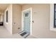 Welcoming front door with a modern keypad, and a gray striped door mat at 900 E Marion Ave # 1203, Punta Gorda, FL 33950
