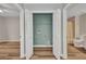 Laundry closet equipped with washer and dryer hookups, along with access to the bathroom at 900 E Marion Ave # 1203, Punta Gorda, FL 33950