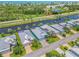 An aerial view showcasing a waterfront community and stunning natural landscaping at 10478 Coquina Ct, Placida, FL 33946