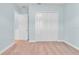 Neutral bedroom featuring carpet and a double closet at 10478 Coquina Ct, Placida, FL 33946