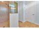 Glass shower with tile surround, rain shower head, and tiled floors at 10478 Coquina Ct, Placida, FL 33946