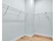 A well-organized walk-in closet featuring white wire shelving at 10478 Coquina Ct, Placida, FL 33946