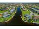 Expansive aerial view of waterfront homes bordering a canal community at 1323 Mineo Dr, Punta Gorda, FL 33950