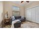 Comfortable den with a couch and a closet at 1323 Mineo Dr, Punta Gorda, FL 33950
