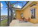 Outdoor living space with comfortable lounge seating and partial canal views at 1323 Mineo Dr, Punta Gorda, FL 33950