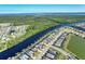 Desirable waterfront community boasting access to waterways, lush landscaping, and beautiful homes at 14436 Ponce De Leon Trl, Port Charlotte, FL 33981