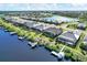 Waterfront community featuring private docks, lush landscaping, and serene water views from above at 14436 Ponce De Leon Trl, Port Charlotte, FL 33981