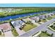 Premier waterfront neighborhood boasting a scenic waterway, lush landscaping, and an array of stunning homes at 14436 Ponce De Leon Trl, Port Charlotte, FL 33981