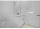 Bathroom with a modern sink vanity and framed mirror at 17156 Eugene Ave, Port Charlotte, FL 33954