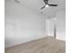 Spacious bedroom featuring a ceiling fan and light wood-look floors at 17156 Eugene Ave, Port Charlotte, FL 33954