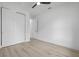 Bright bedroom with luxury vinyl flooring and minimalist decor at 17156 Eugene Ave, Port Charlotte, FL 33954
