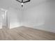 Spacious bedroom featuring a ceiling fan and light wood-look floors at 17156 Eugene Ave, Port Charlotte, FL 33954