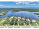 An impressive view of this waterfront home and its landscaping and surrounding natural beauty at 17509 Ohara Dr, Port Charlotte, FL 33948