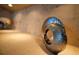 Close-up of unique circular metal decor item, adding a modern, sculptural element to the space at 17509 Ohara Dr, Port Charlotte, FL 33948