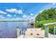 A private boat dock and lift provide direct access to the water at 17509 Ohara Dr, Port Charlotte, FL 33948